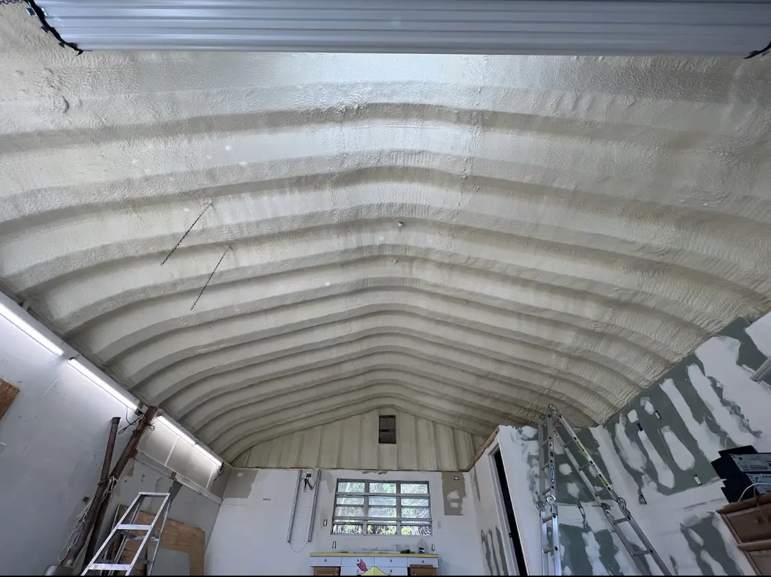 Spray polyurethane foam applied to the underside of a metal roof deck in Coolbaugh